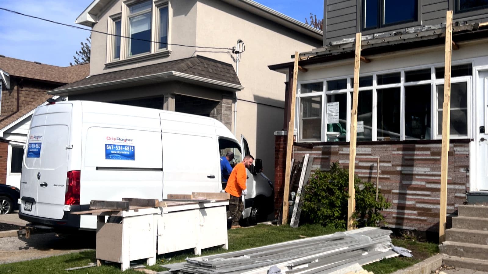 Technician locating and repairing a leaking drain line