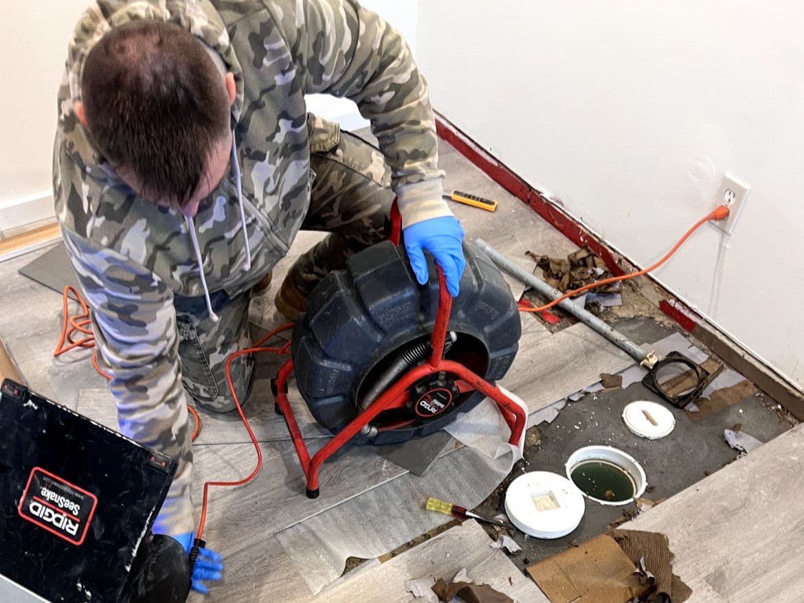 Emergency plumber responding to an urgent leak