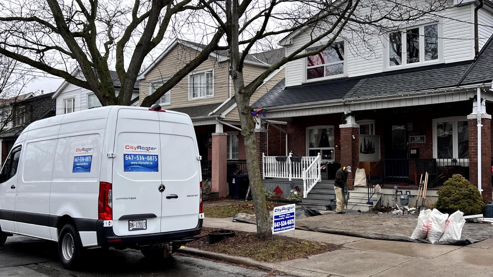 Plumber inspecting a residential drainage and sewer problem